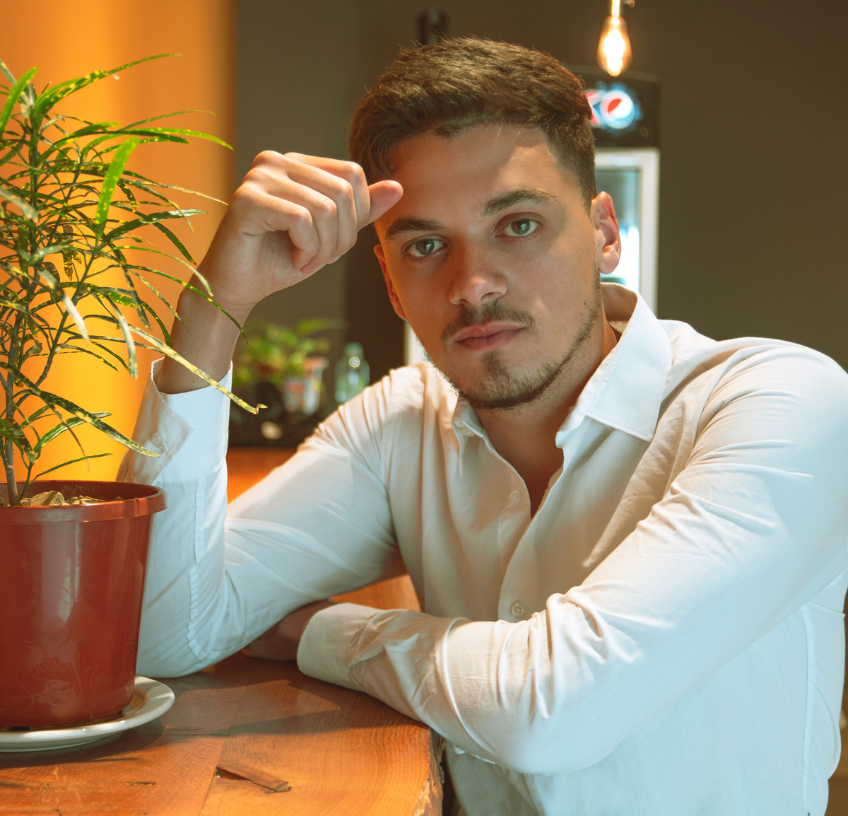 A Man Wearing White Long Sleeves