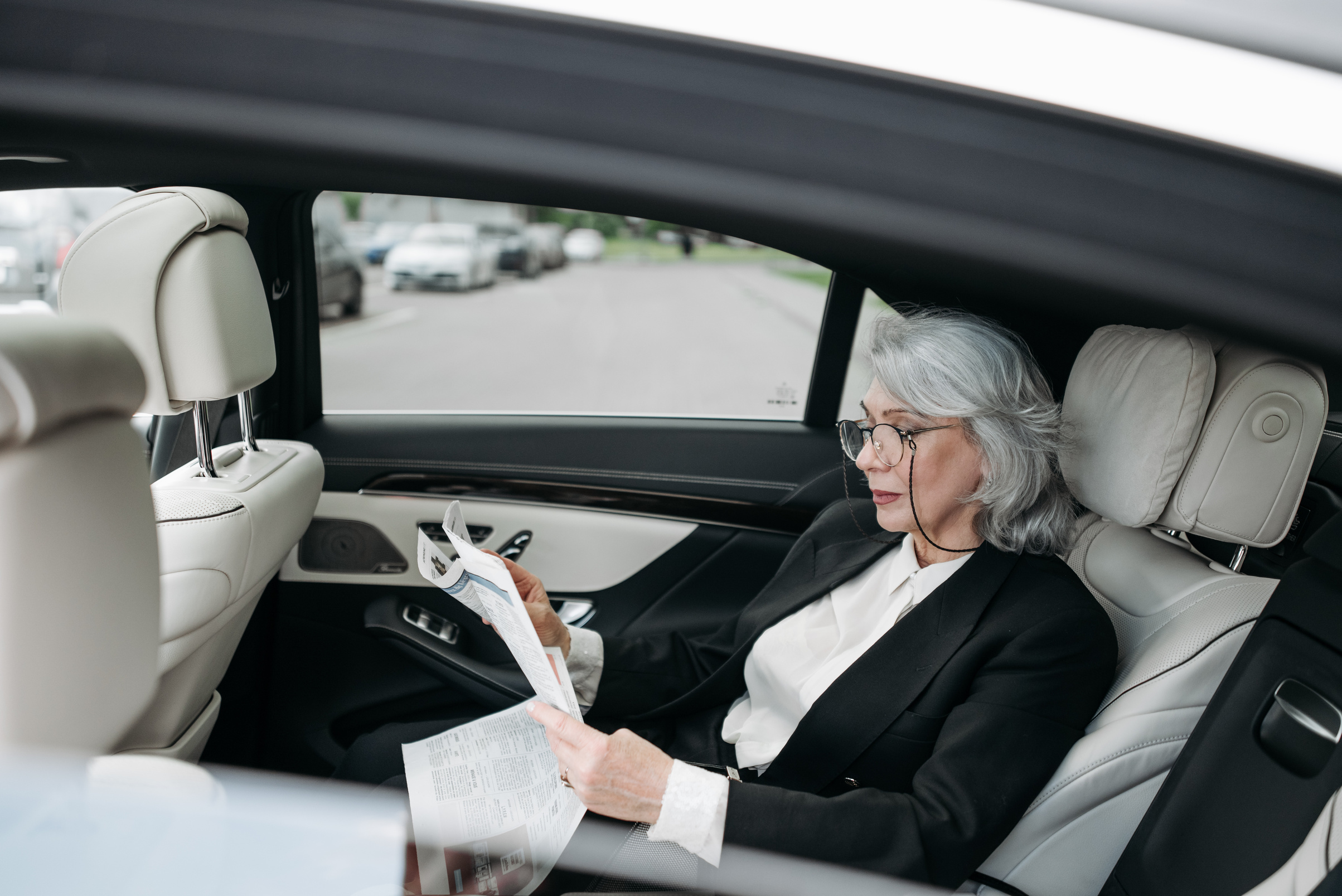 A Businesswoman Reading a Newspaper 